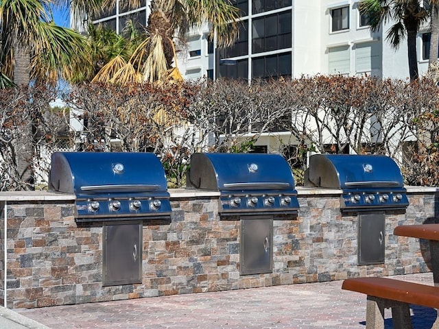 view of patio with exterior kitchen and grilling area