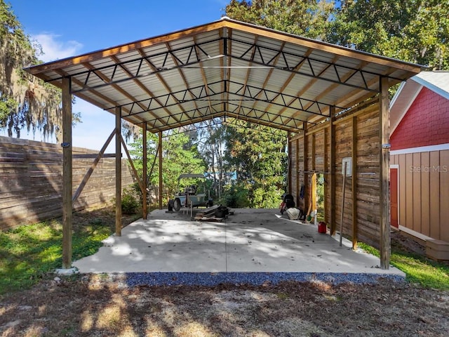 view of vehicle parking featuring a carport