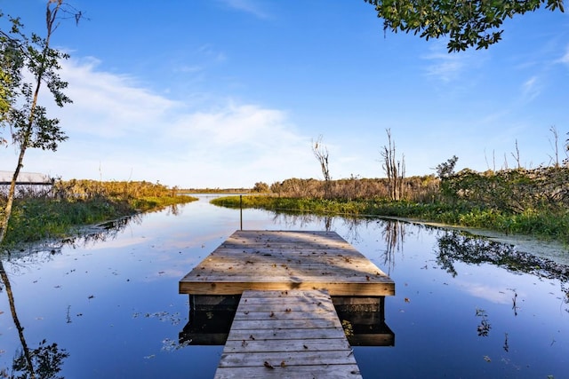 view of dock with a water view