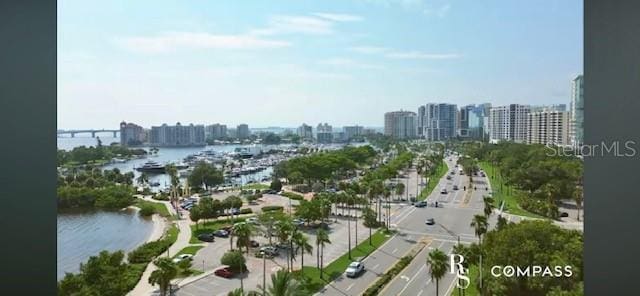 drone / aerial view featuring a water view