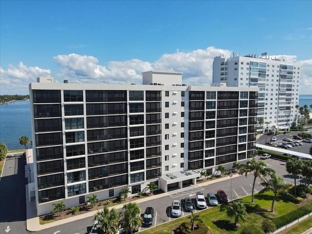 view of building exterior with a water view