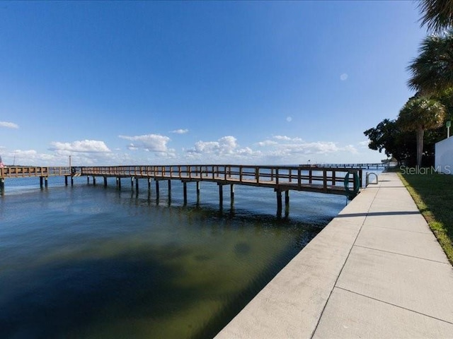 dock area featuring a water view