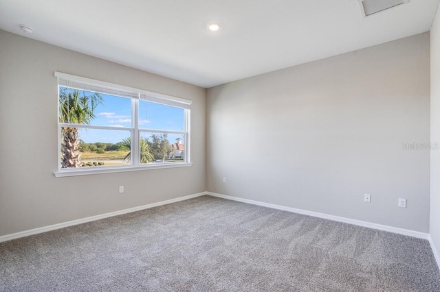 unfurnished room with carpet