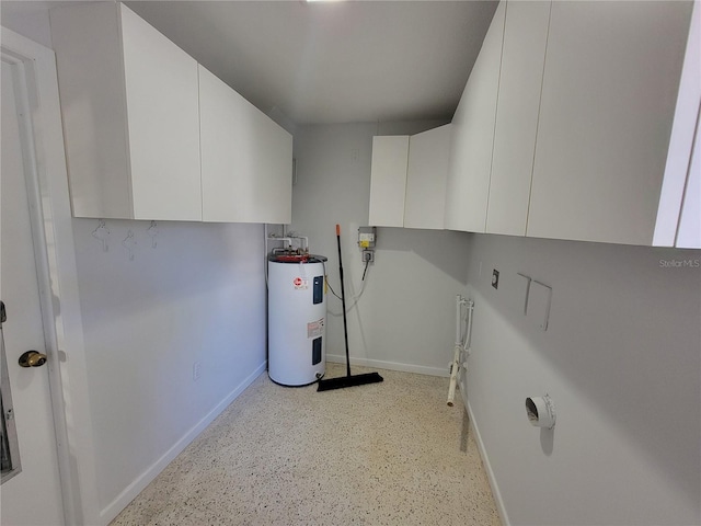 laundry area featuring water heater