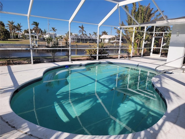 view of pool featuring a lanai and a patio area