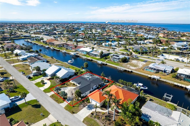 drone / aerial view featuring a water view