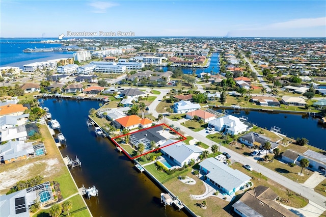 drone / aerial view with a water view