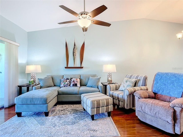 living room with dark hardwood / wood-style flooring, ceiling fan, and lofted ceiling