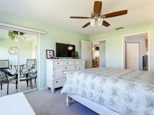 bedroom featuring light carpet, access to exterior, and ceiling fan