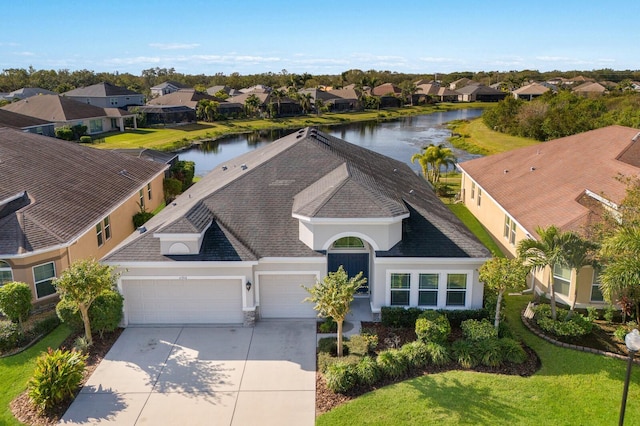 drone / aerial view with a water view