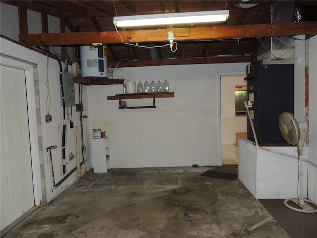 basement featuring electric water heater, heating unit, and electric panel