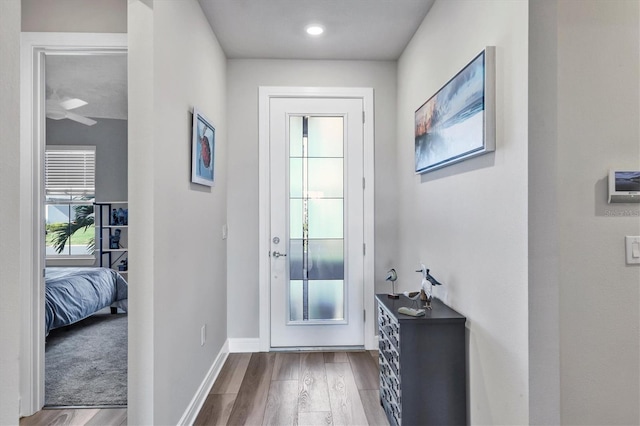 entryway with light hardwood / wood-style floors