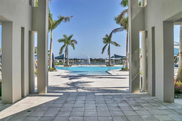 view of swimming pool featuring a patio