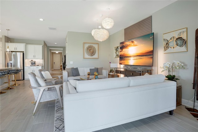 living room featuring light wood-type flooring