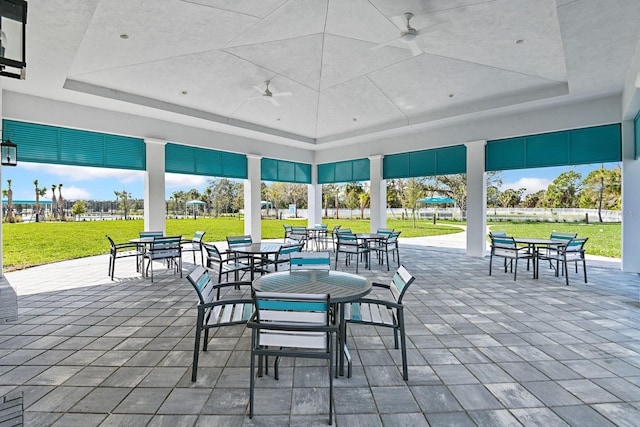 view of patio featuring ceiling fan