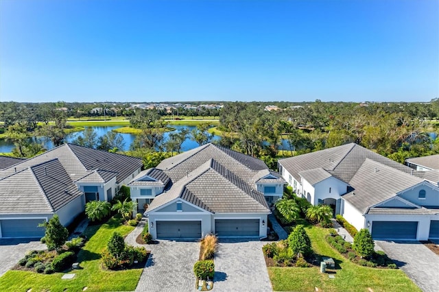 bird's eye view with a water view