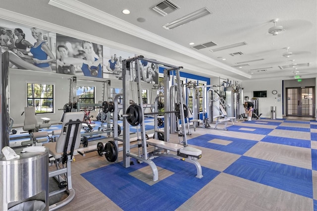 workout area with french doors, carpet floors, a textured ceiling, and ornamental molding