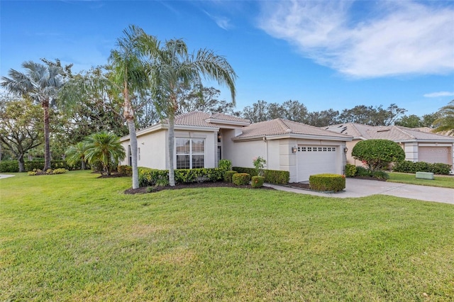 view of front of house featuring a front lawn and a garage