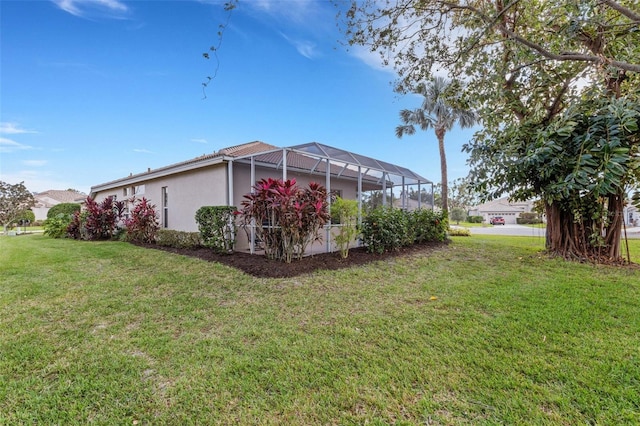 view of yard featuring a lanai