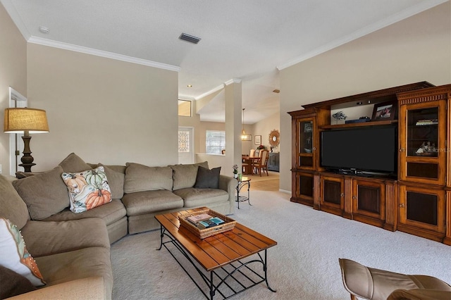 living room featuring light colored carpet and crown molding