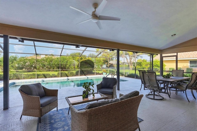 sunroom / solarium with vaulted ceiling and ceiling fan