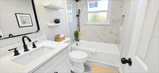 full bathroom with shower / tub combination, toilet, and vanity