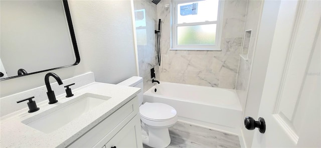 full bathroom featuring shower / bathtub combination, toilet, and vanity