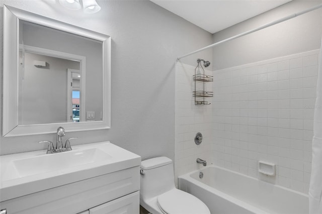 full bathroom featuring shower / tub combo with curtain, vanity, and toilet