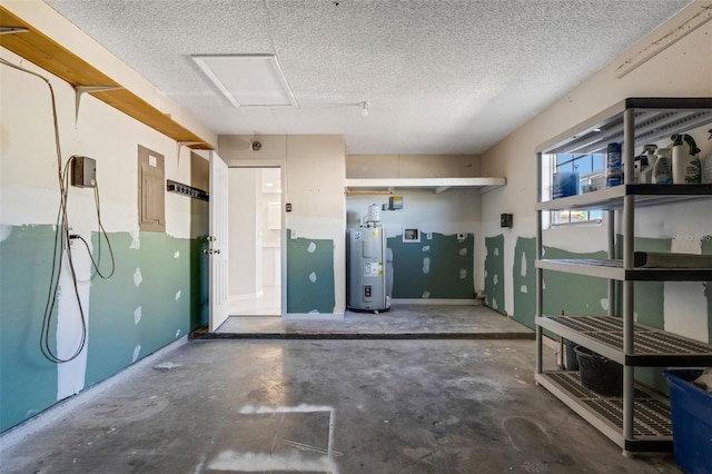 garage with electric panel and water heater