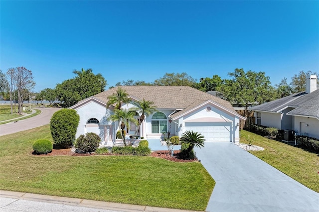 ranch-style house with cooling unit, a front yard, and a garage