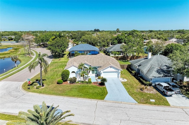 drone / aerial view featuring a water view