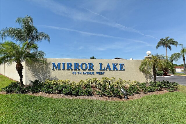 3609 59th Ave W Unit 4045, Bradenton, FL 34210 - community / neighborhood sign featuring a lawn