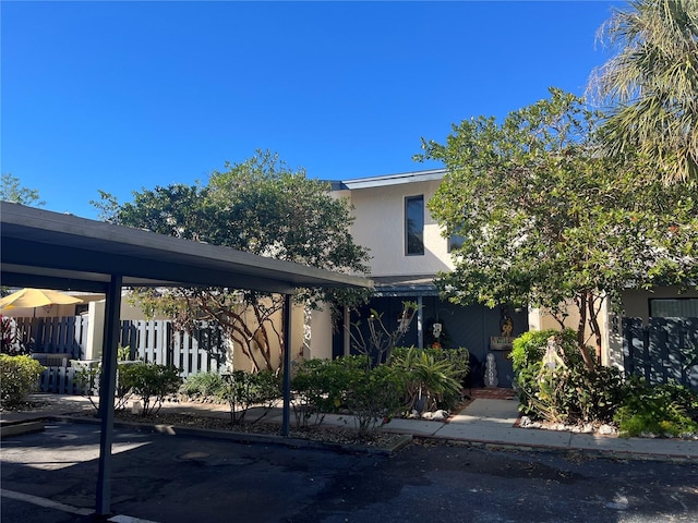 view of front facade featuring a carport