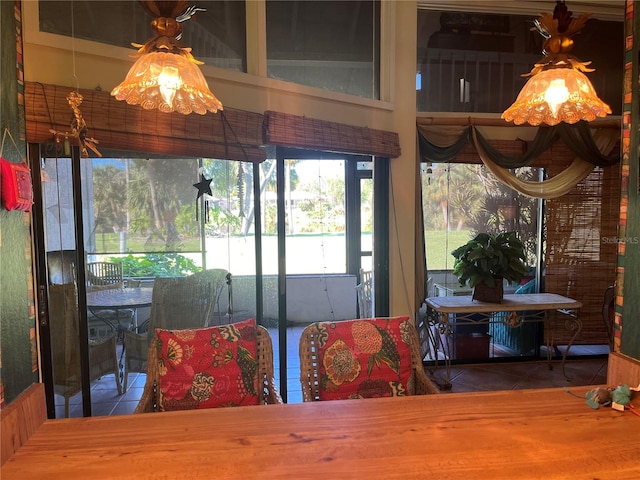 dining space with tile patterned floors