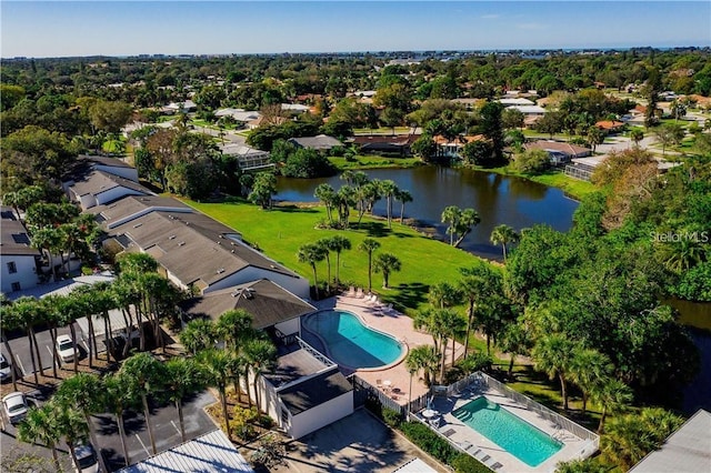 drone / aerial view with a water view