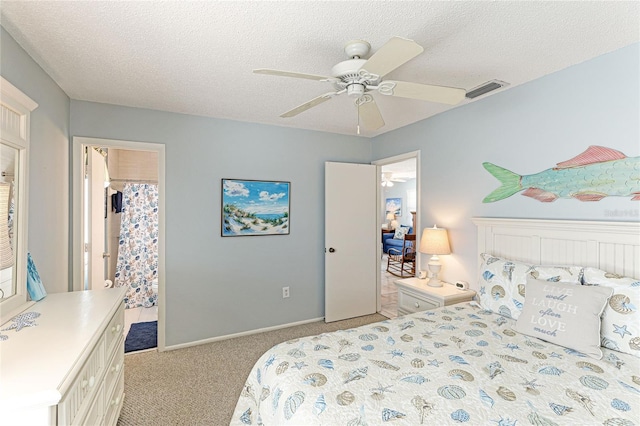 bedroom with light carpet, a textured ceiling, and ceiling fan