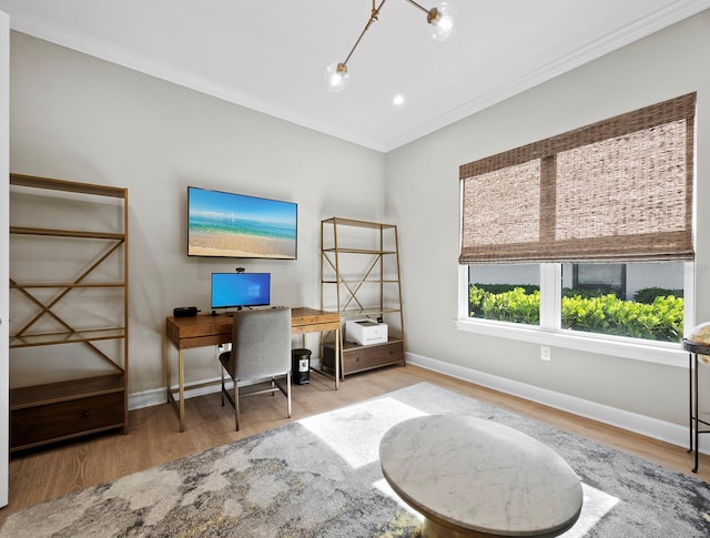 office area featuring ornamental molding and light wood-type flooring