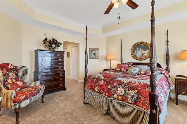 carpeted bedroom with ceiling fan and crown molding