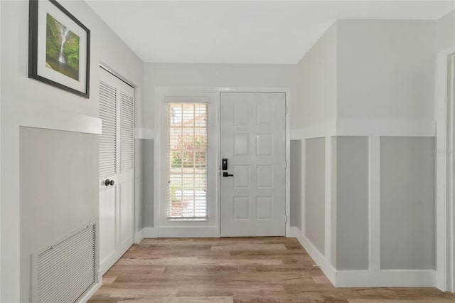 foyer entrance featuring light hardwood / wood-style flooring