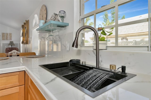 room details with tasteful backsplash and sink