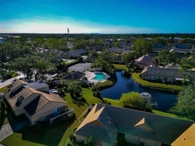 drone / aerial view with a water view