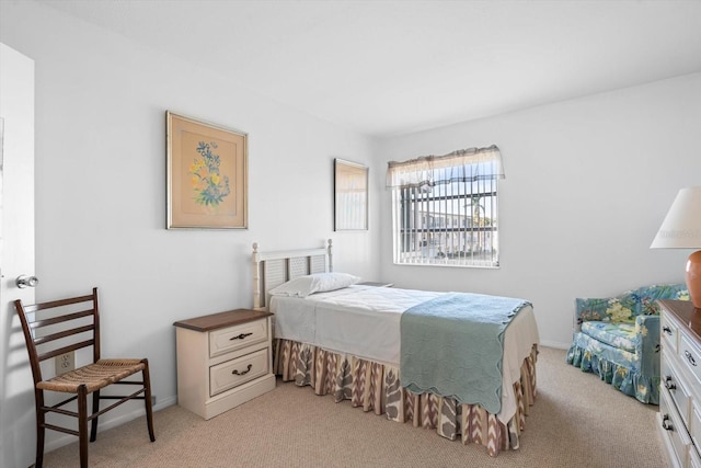 5902 Garden Ln Unit A24, Bradenton, FL 34207 - bedroom featuring light colored carpet