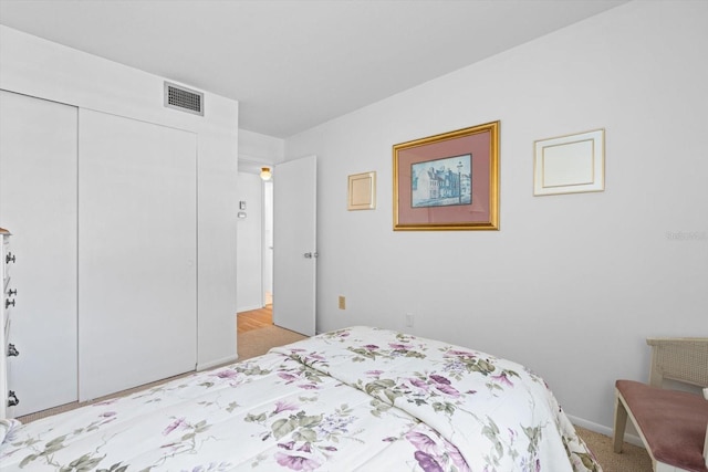 5902 Garden Ln Unit A24, Bradenton, FL 34207 - bedroom with light carpet and a closet