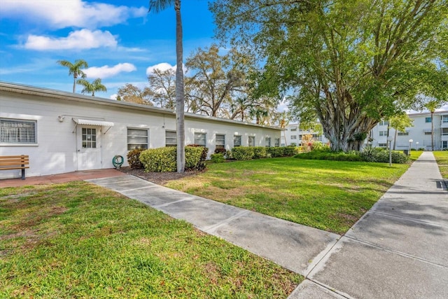 view of front facade with a front lawn