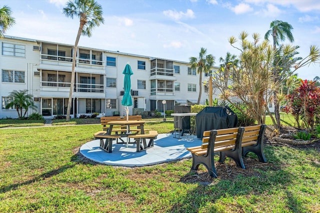 5902 Garden Ln Unit A24, Bradenton, FL 34207 - view of property's community featuring a yard and a patio
