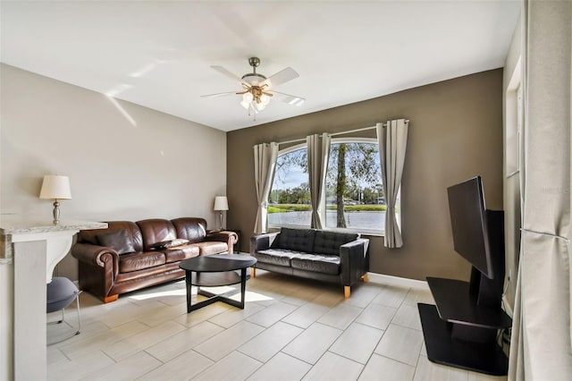 living room featuring ceiling fan