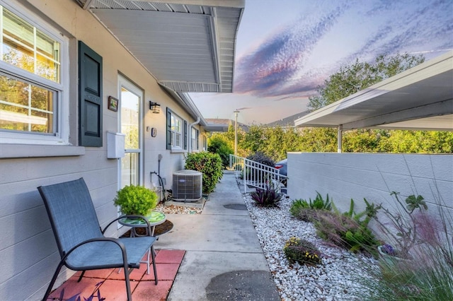 patio terrace at dusk with cooling unit