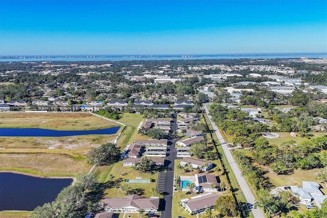 drone / aerial view with a water view