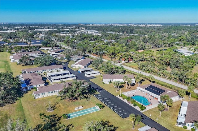 birds eye view of property with a residential view