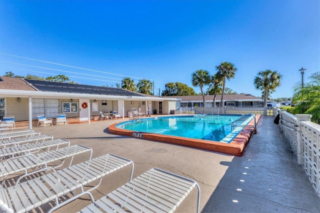 pool featuring a patio area